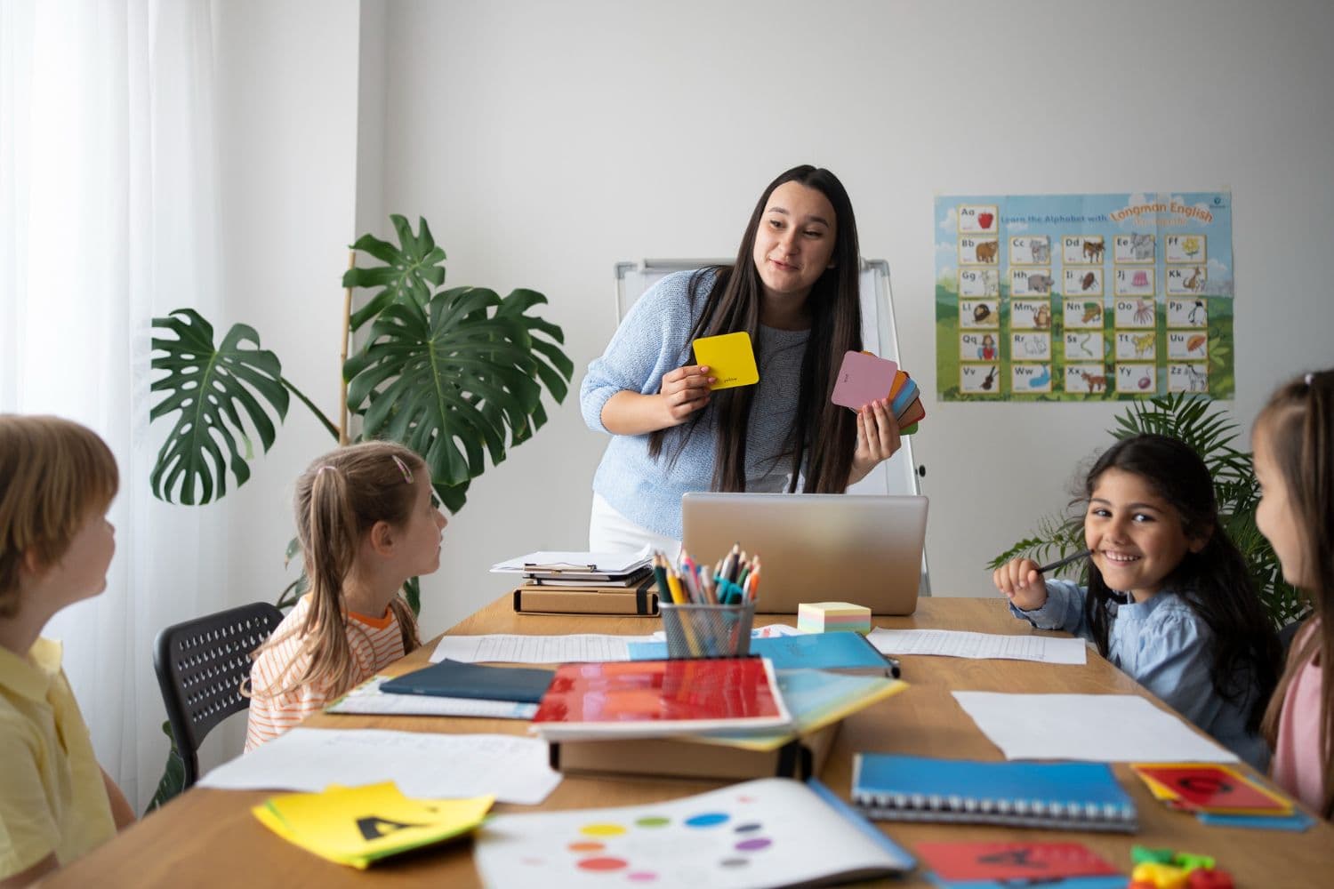 Smiley Teacher Explaining Kids